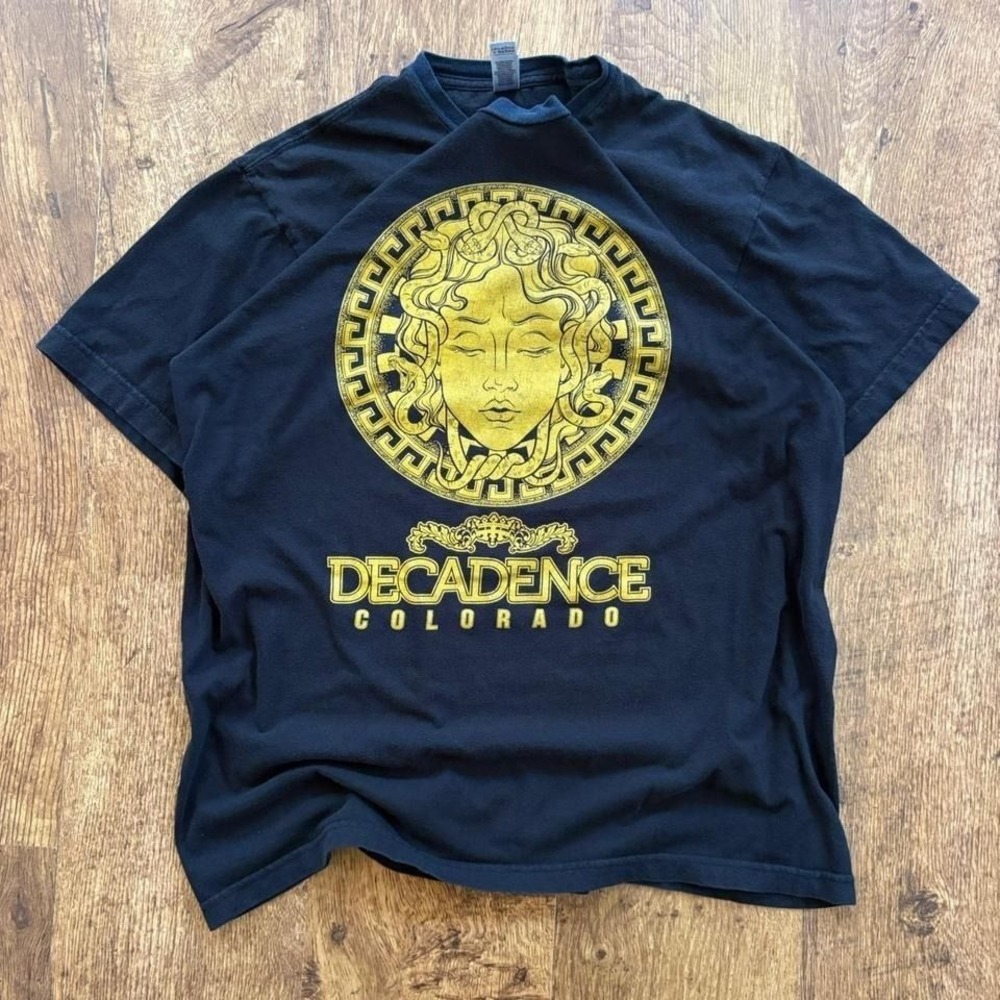 Faded black Decadence Colorado concert tee‎ with gold Medusa graphic,